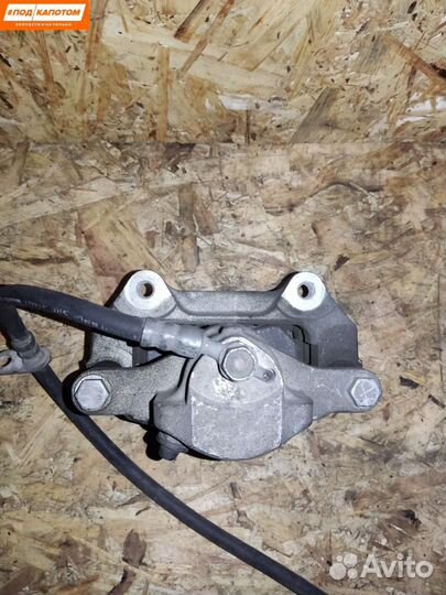 Суппорт тормозной задний левый Toyota Camry XV40