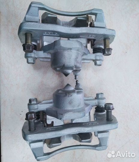 Суппорт передний левый/правый KIA Spectra 2000г