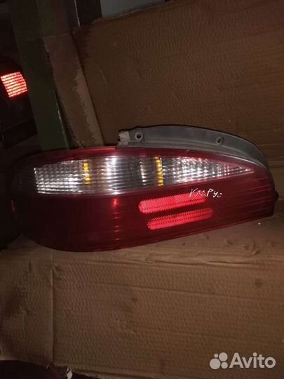 Фонарь левый Kia Clarus