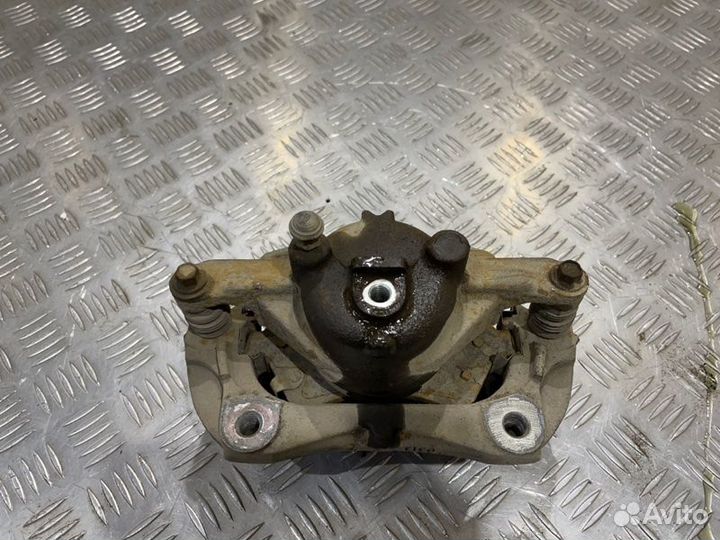 Суппорт тормозной передний левый Chevrolet Cruze