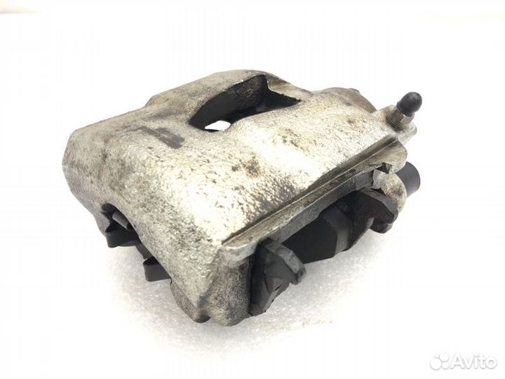 Суппорт тормозной передний левый Volkswagen Jetta