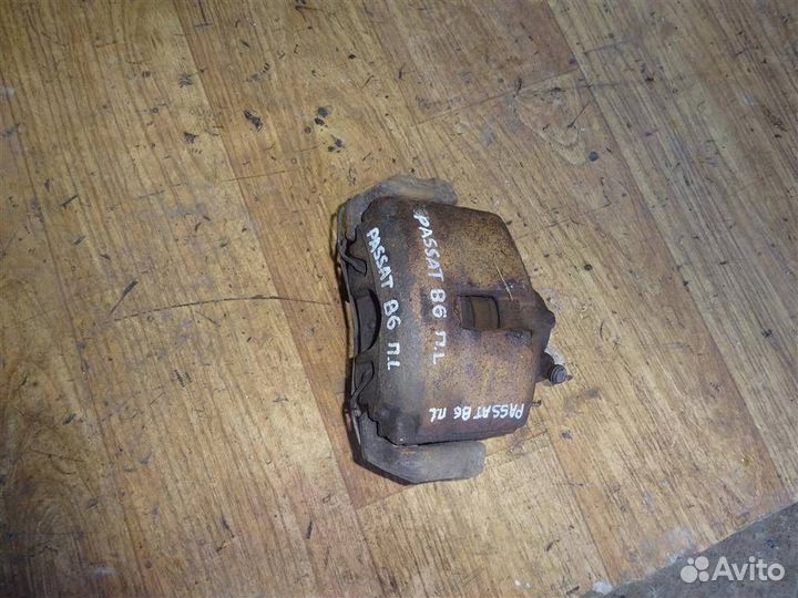 Суппорт передний левый Volkswagen Passat B6 200