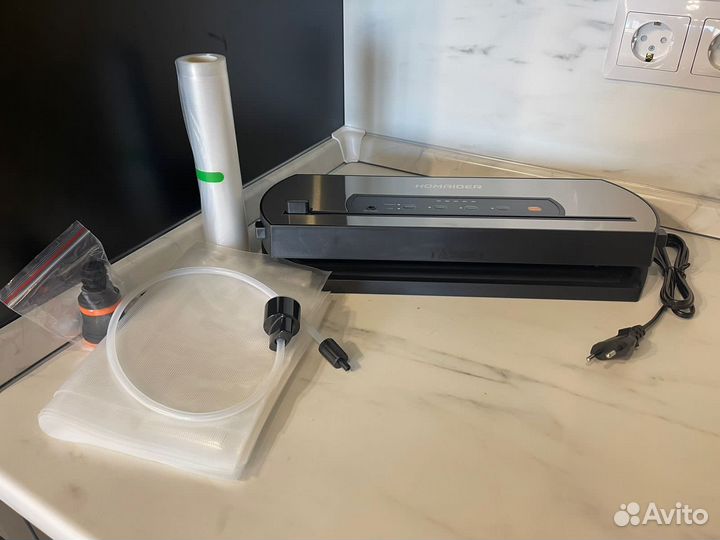 Вакуумный упаковщик