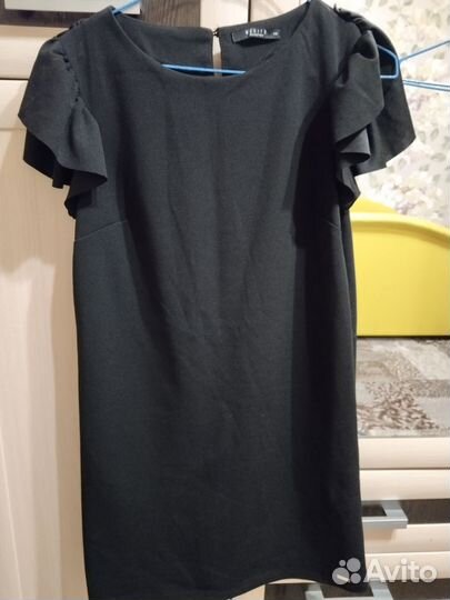 Пакет одежды и ботинки