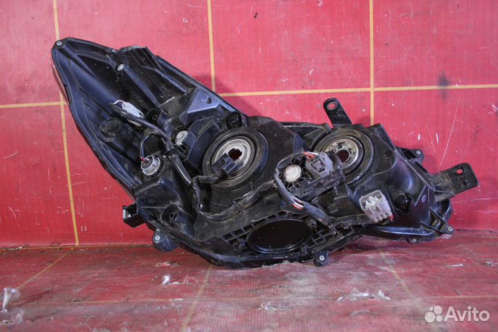 Фара левая Subaru Impreza