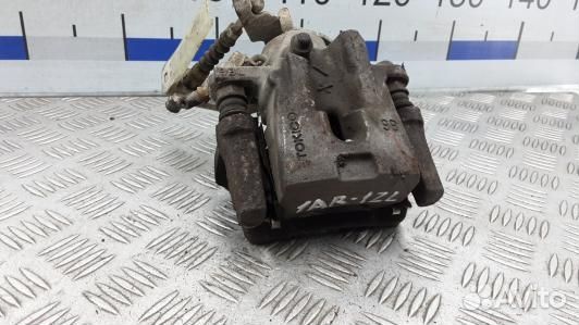 Суппорт тормозной задний левый toyota urban cruise