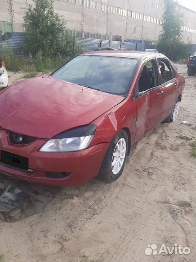 Mitsubishi Lancer 1.3 МТ, 2005, битый, 190 000 км