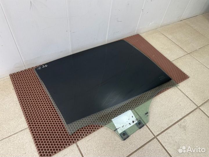 Стекло двери заднее правое Renault Logan