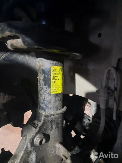 Стойка амортизатора передняя opel zafira tourer