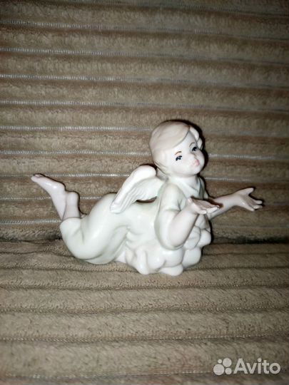 Ангел на облаке