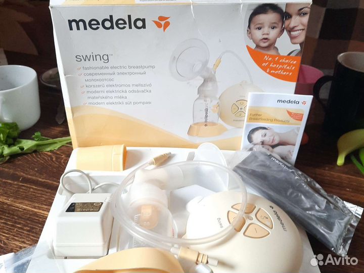 Молокоотсос medela электрический
