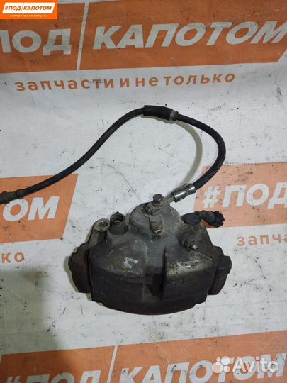 Суппорт тормозной передний левый Volkswagen 2