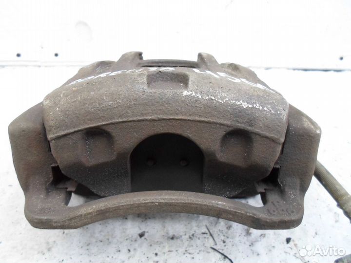 Суппорт передний левый Kia Sorento 2 XM