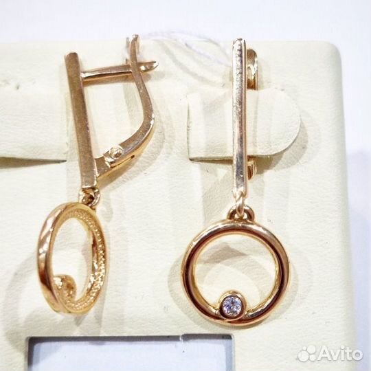 Золотые серьги с камнем