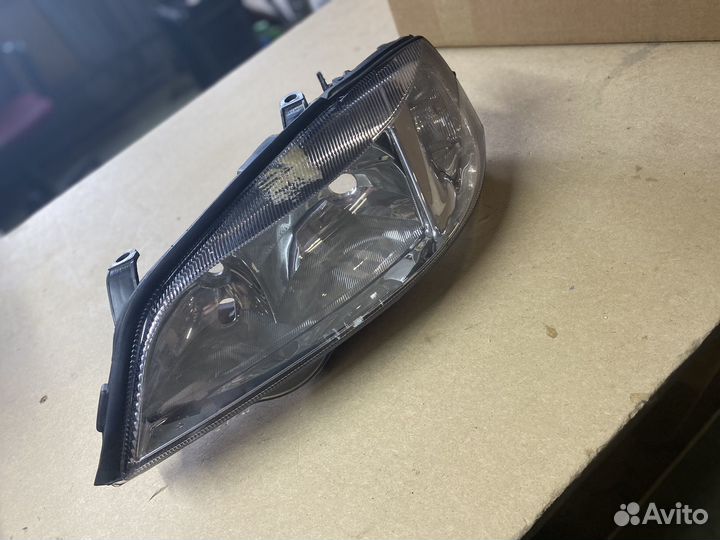 Фара передняя левая opel astra g