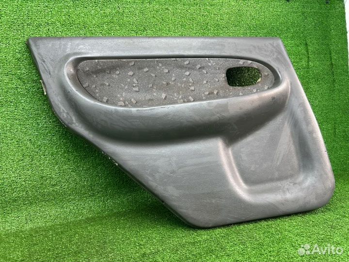 Обшивка двери задняя левая Kia Spectra