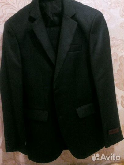 Продам новый костюм 46 размер