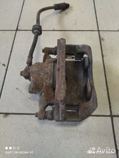 Суппорт тормозной передний правый Chevrolet Cruze