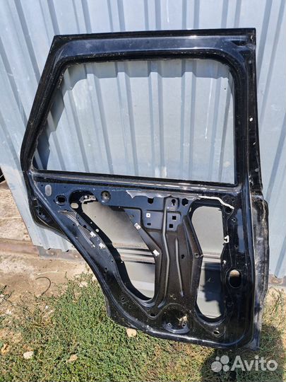 Дверь задний левый Cadillac SRX