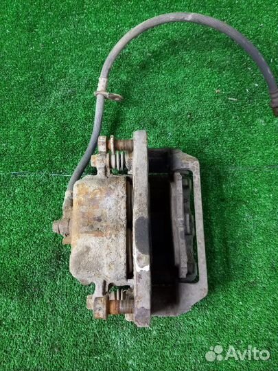 Суппорт тормозной передний левый Subaru Legacy