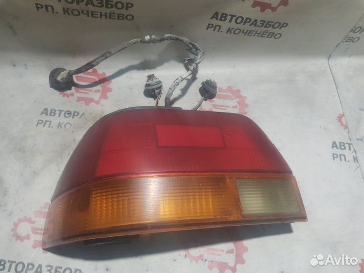 Фонарь заднего хода задний левый Toyota Corolla