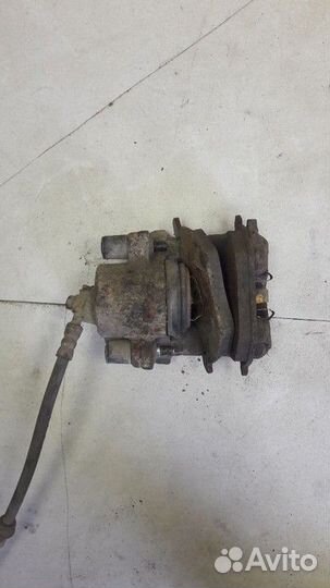 Суппорт тормозной передний левый Skoda Fabia