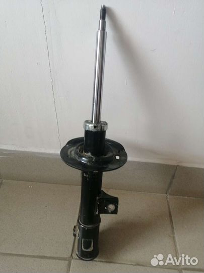 Амортизатор пер левый KIA Sportage 3