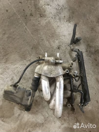 Коллектор впускной (Mazda 323)