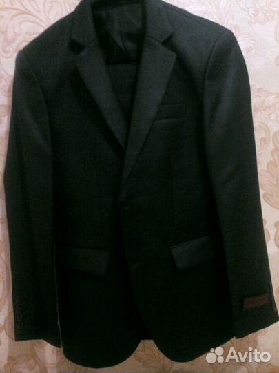Продам новый костюм 46 размер