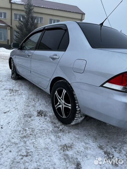 Mitsubishi Lancer 1.6 AT, 2006, 185 000 км