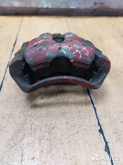 Тормозной суппорт передний левый Opel Combo Z14XEP