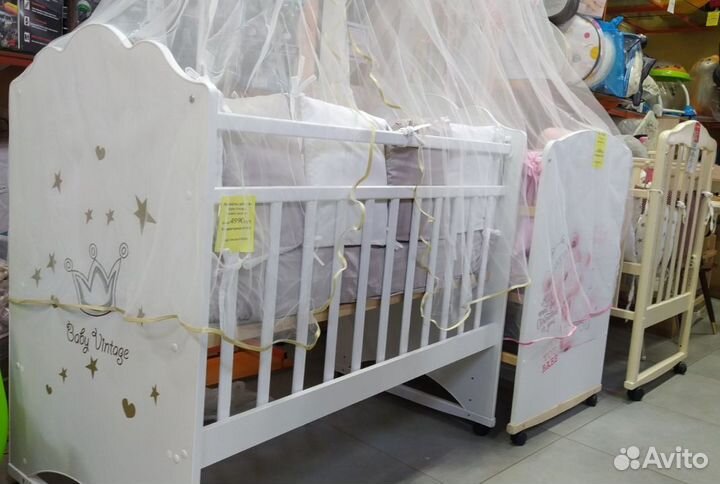 Детская кроватка колесо качалка