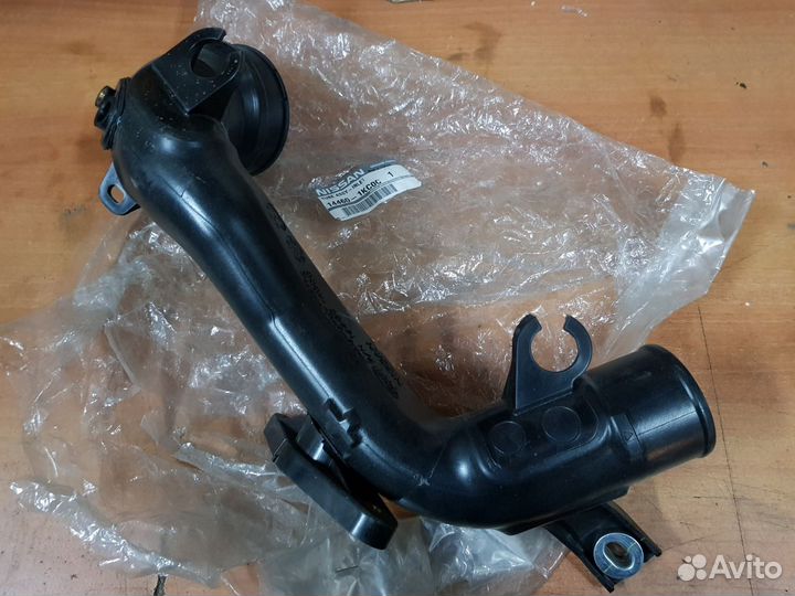 Патрубок радиатора Ниссан Жук F15 144601KC0C