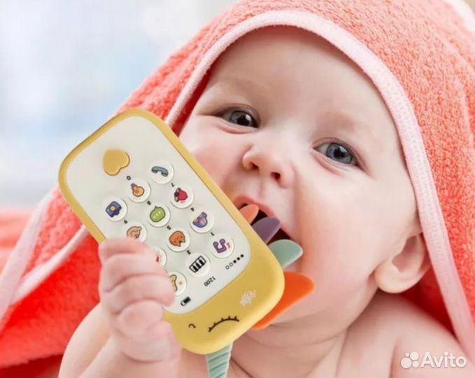 Музыкальный телефон игрушка