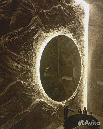 Барельеф на стене в интерьере