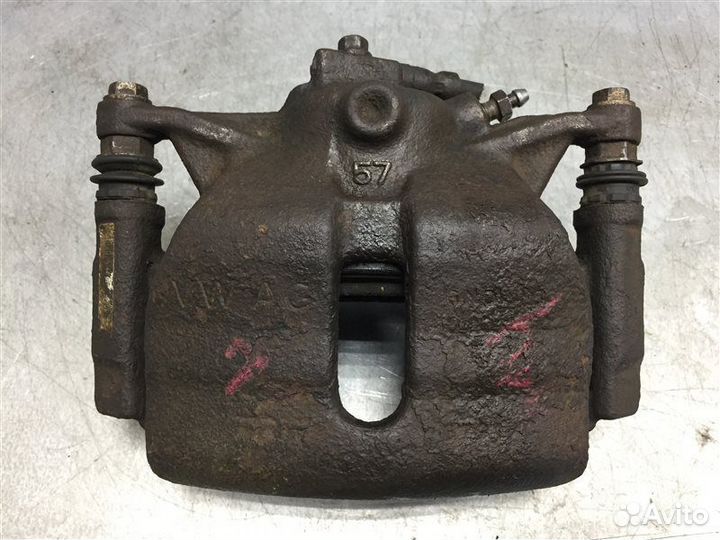 Суппорт тормозной передний левый Skoda Octavia A7