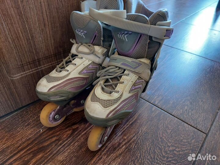 Роликовые коньки