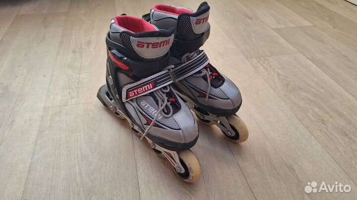 Роликовые коньки