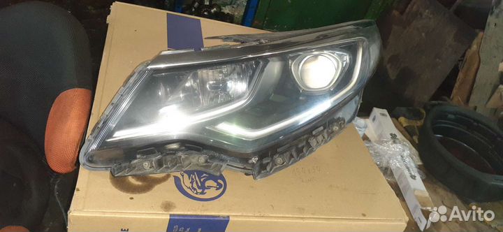 Передний левый фара Kia Optima
