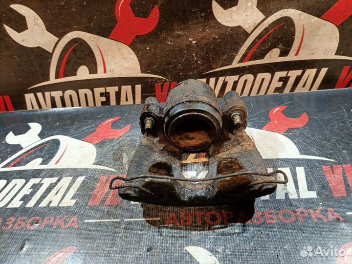 Суппорт тормозной передний левый Ford Focus 2