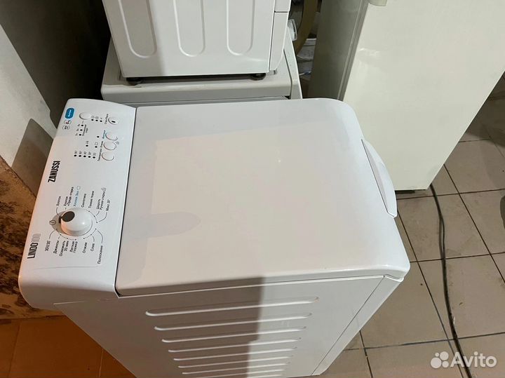 Стиральная машинка с вертикальной загрузкой