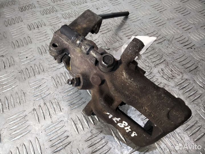 Суппорт задний левый Nissan Almera N16