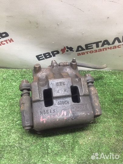 Суппорт тормозной передний левый Mazda Cx-7