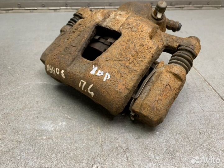 Суппорт передний левый Chevrolet Lanos седан 1.5