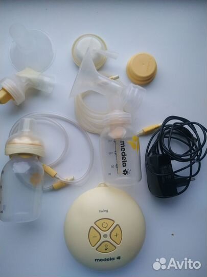 Молокоотсос medela swing
