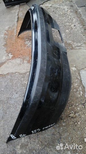 Бампер Mazda 323F 1