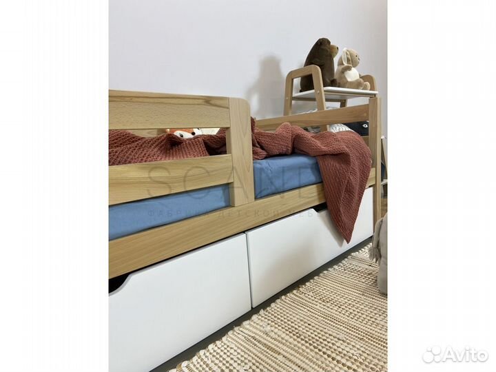 Детская кроватка с бортиком из бука