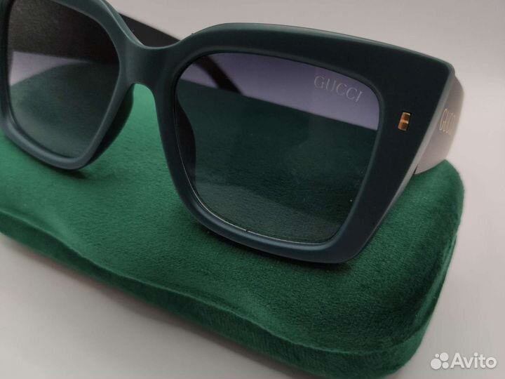 Солнцезащитные женские очки Gucci