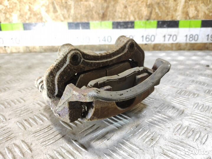 Суппорт передний правый Nissan Almera Classic