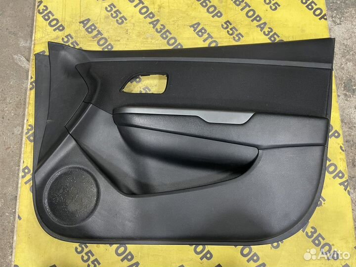 Обшивка двери передней правой Kia Rio 3